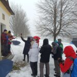 Zpívání koled u kapličky