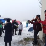 Zpívání koled u kapličky