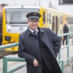 Vlakvedoucí a průvodčí Phan Anh Tran